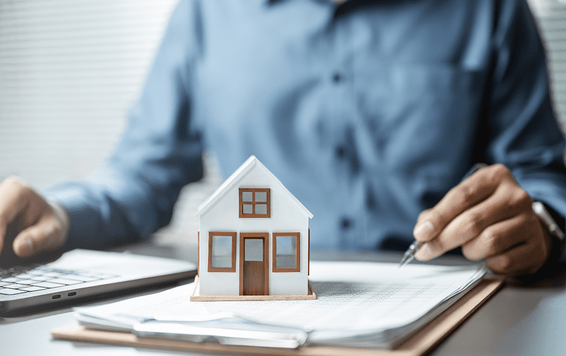 Man working on real estate documents